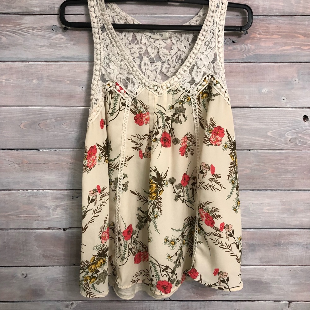 Lightly worn floral print woman’s tank top